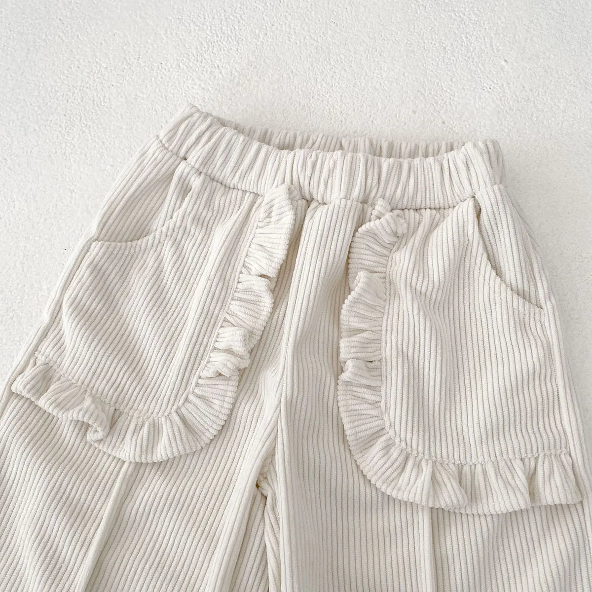 RUFFLE POCKET CORDUROY TROUSERS